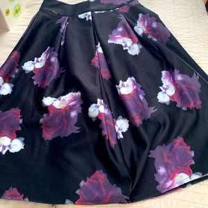 A-line, knee-length skirt.